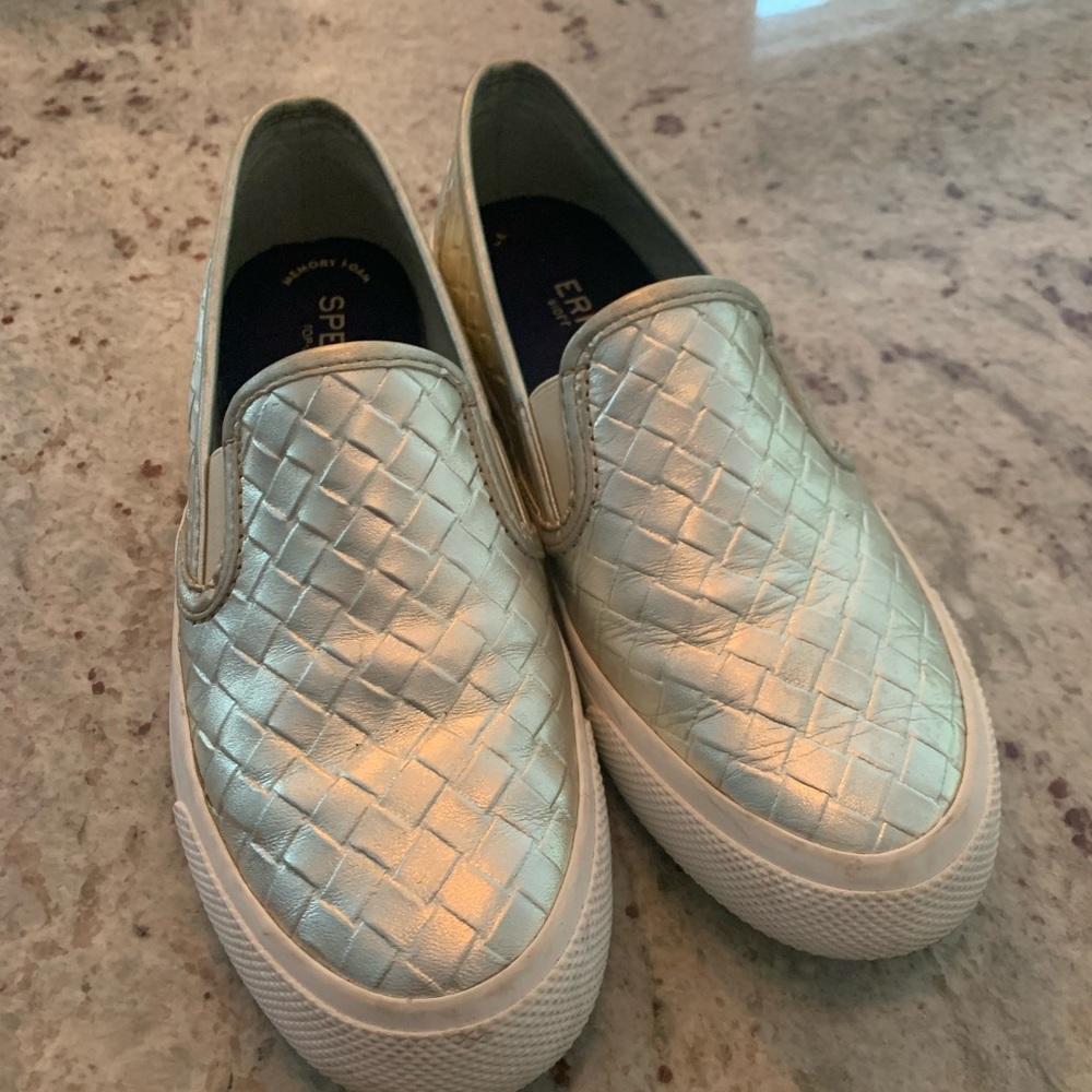 Platinum colored sperry slip on sneakers